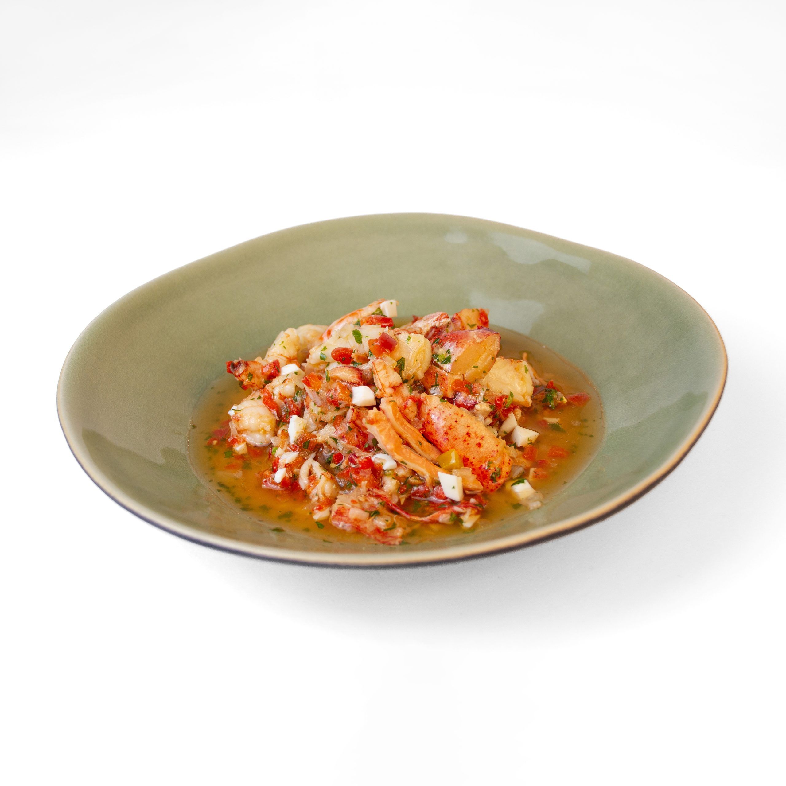 Emplatado de salpicón de bogavante y langostinos Emplatado de conservas caseras y premium Lorixe de la gama de salpicón de bogavante y langostinos